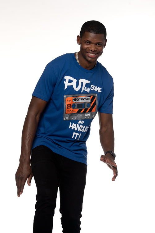 Cooyah Jamaica. Put on Some 90s Dancehall and Handle it! Men's crew neck t-shirt in blue with a retro cassette tape design. We are a Jamaican owned clothing brand established in 1987.