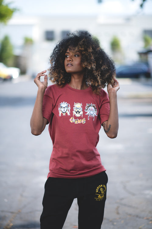 Cooyah Jamiaca.  Women's African Tribal Mask Tee in rust orange.