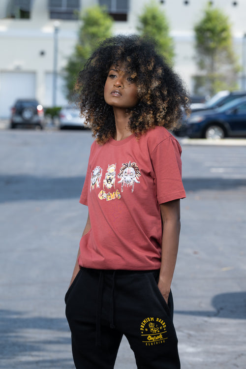 Cooyah Jamiaca. Women's African Tribal Mask Tee in rust orange..