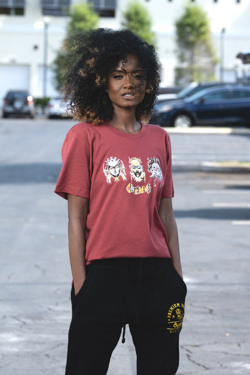 Cooyah Jamiaca. Women's African Tribal Mask Tee in rust orange.
