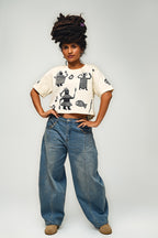 Cooyah - women's boxy fit crop top with screen printed African graphics on the front, back, and sleeves.