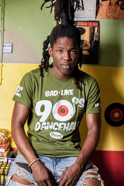 Cooyah Jamaica. Men's Bad Like 90s Dancehall graphic tee in olive green.  We are a Jamaican owned clothing brand since 1987.