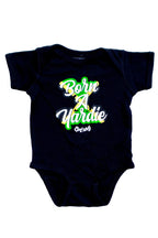 Cooyah.  Born A Yardie Jamaica baby onesie in black.  Jamaican reggae clothing brand.