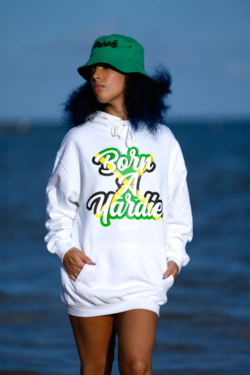Cooyah Jamaica.  Born A Yardie pullover hoodie in white.  The design is screen printed in Jamaican colors.  Worldwide shipping available