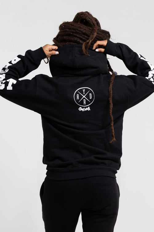 Cooyah Clothing.  Women's Irie Yard Jamaica black hoodie.  As a Jamaican owned clothing brand since 1987, we take pride in bringing you this classic piece. Don't wait, get yours now!