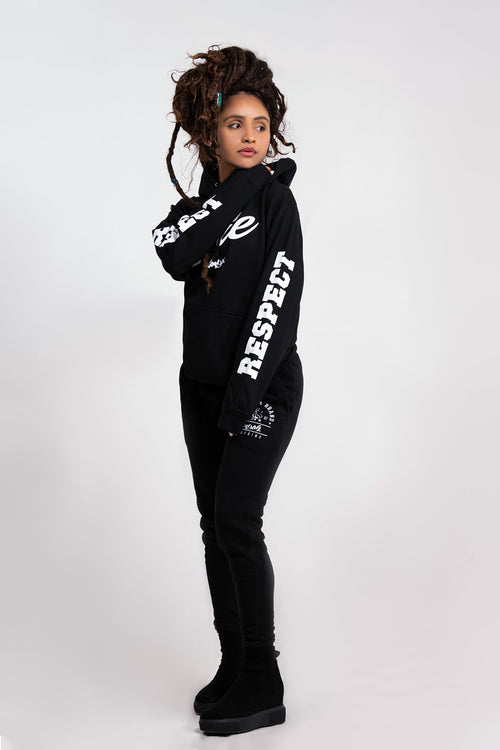 Cooyah Jamaica. Women's Irie red pullover hoodie with Respect screen print on the sleeves.   As a Jamaican owned clothing brand since 1987, we take pride in bringing you this classic piece.