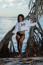 Cooyah Jamaica. Women's long sleeve crop top with irie graphic. We are a Jamaican owned clothing brand established in 1987.