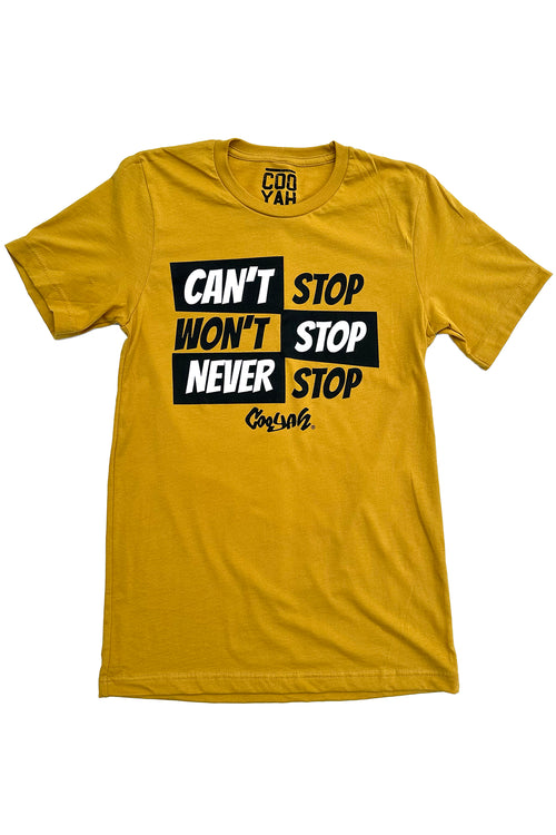 Cooyah Jamaica. Men's Can't Stop, Won't Stop, Never Stop graphic tee in mustard yellow. We are a Jamaican clothing brand established in 1987.