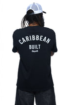 Man wearing a black t-shirt with 'Caribbean Built' text on the back and Cooyah logo while standing against a white background.