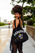 Caribbean Built Tote Bag with hand-painted reggae colors on both sides. Cooyah label stitched on the back.
