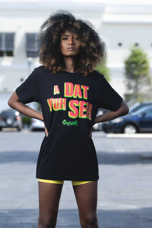 Cooyah Jamaica. Women's Jamaican patois tee with "A Dat Yuh Seh" graphic on the front. Caribbean clothing brand since 1987. IRIE