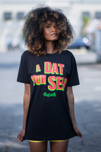 Cooyah Jamaica.  Women's Jamaican patois tee with "A Dat Yuh Seh" graphic on the front.  Caribbean clothing brand since 1987.  IRIE