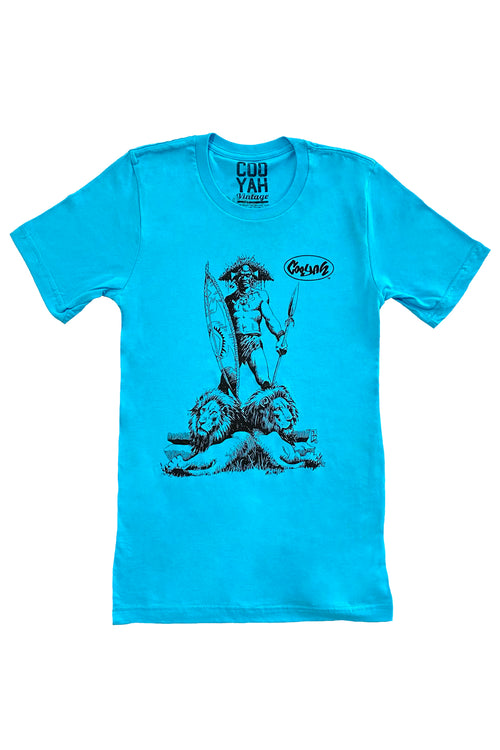 Cooyah Jamaica Men's African Warrior Lion graphic tee in blue.  Short sleeve, soft, ringspun cotton.  Created from an. original hand-drawn design.  As a Jamaican owned clothing brand since 1987, we take pride in bringing you this classic piece.