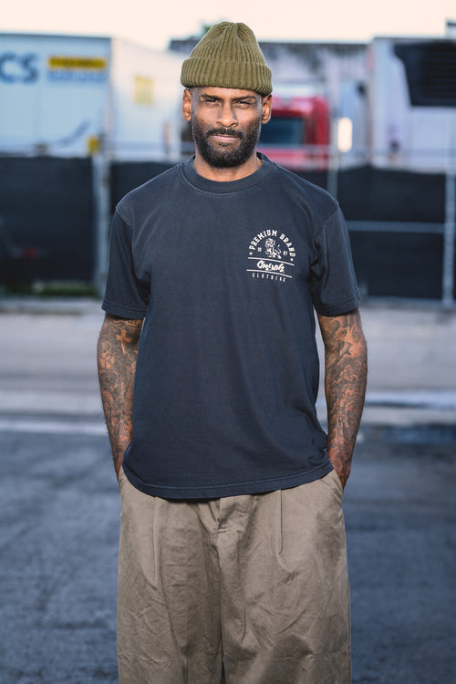 Cooyah Jamaica - Men's boxy fit Premium Brand Graphic Tee with Lion print in blue. We are a Jamaican owned clothing brand established in 1987.