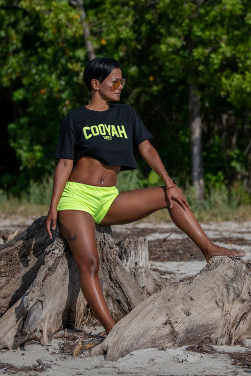 Cooyah Jamaica women's crop top. Black tee with neon yellow print on soft, ringspun cotton.
