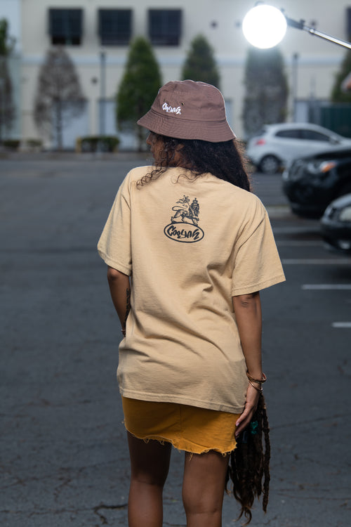 Cooyah Jamaica. Empress Menen short sleeve graphic tee on a brown shirt. Rasta Rootswear clothing. Rastafari