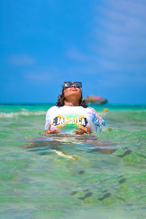 Cooyah Jamaica white graphic tee. Jamaican clothing brand. Beachwear, irie