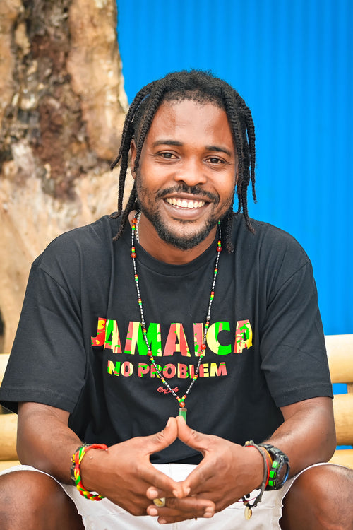 Cooyah Clothing. Jamaica No Problem men's graphic tee in black. Reggae style design on a short sleeve rinspun cotton t-shirt. Jamaican menswear.  IRIE
