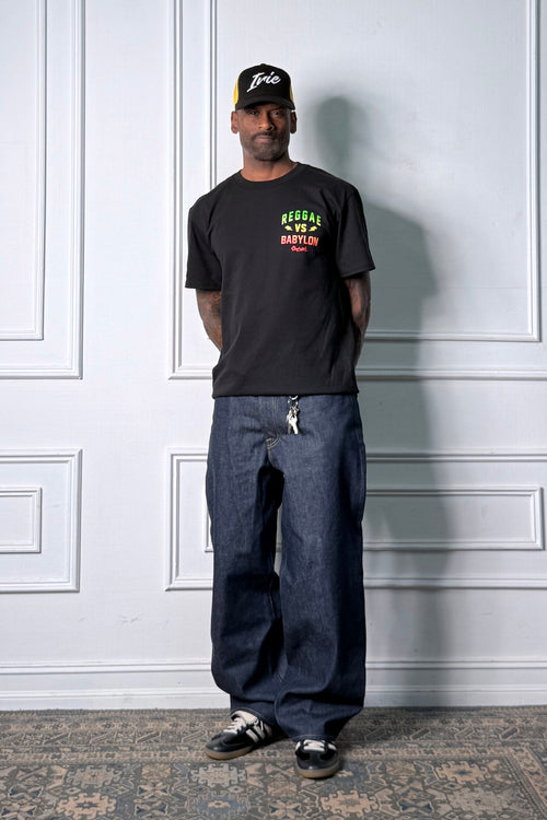 Cooyah Jamaica - Men's Reggae VS Babylon graphic tee. Printed on the front and back in rasta colors.