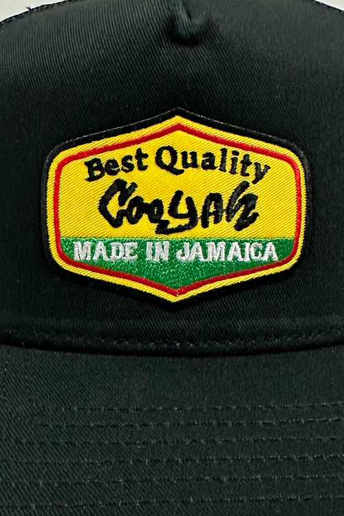 Embroidered Made in Jamaica design on Cooyah trucker cap front panel