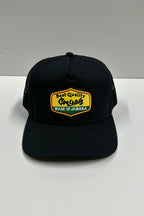 Front view of Made in Jamaica Trucker Hat featuring embroidered logo. Cooyah Clothing brand.