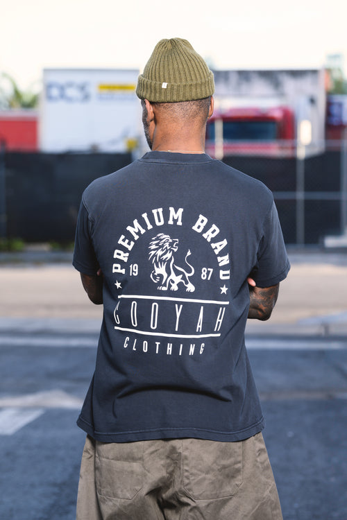 Cooyah Jamaican streetwear clothing - Men's boxy fit Premium Brand Graphic Tee with Lion print.