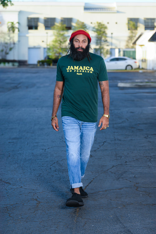 Men's green short sleeve graphic tee with Jamaica No Problem on the front by Cooyah.  We are a Jamaican owned clothing brand established in 1987.