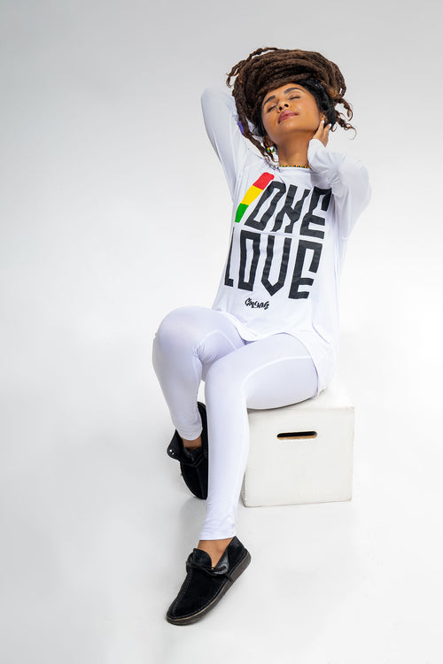 Cooyah Jamaica.  One Love UPF +50 Sunshirt screen printed in rasta colors.  We are a Jamaican beachwear clothing brand since 1987.  IRIE