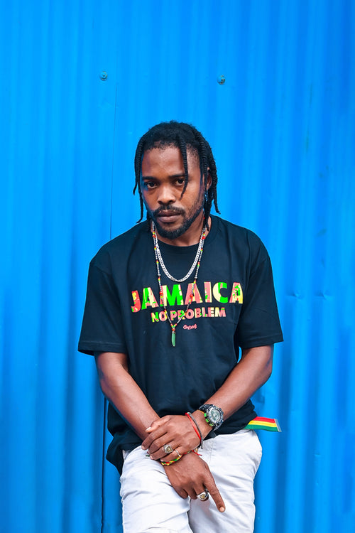 Cooyah Clothing.  Jamaica No Problem men's graphic  tee in black. Reggae style design on a short sleeve rinspun cotton t-shirt. Jamaican menswear fashion.
