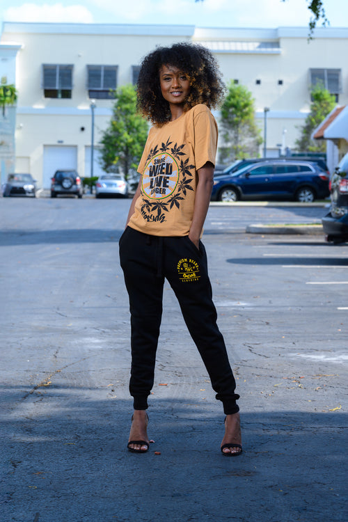 Cooyah Jamaica. Smoke Weed Live Longer Tee. Cannabis, Kush screen printed graphic tee in olive green. Women's short sleeve ringspun cotton t-shirt. Jamaican clothing brand.