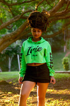 Cooyah - Women's soft, lime green, cropped hoodies with Irie print on the front.