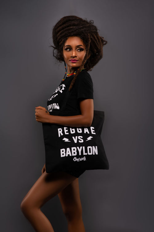 Cooyah Jamaica. Reggae VS Babylon tee in black. Women's short sleeve, ring spun cotton t-shirt. Jamaican streetwear clothing brand. IRIE