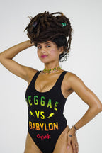 Cooyah -Reggae VS Babylon bodysuit - black with red, gold, and green print on the front.  Thong back