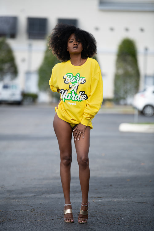 Cooyah women's yellow pullover sweatshirt with Born A Yardie graphic screen printed in Jamaian colors