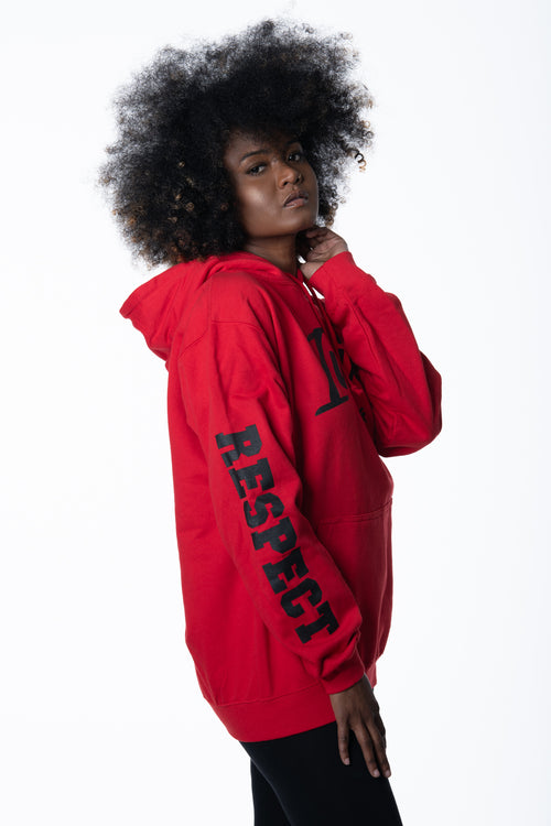 Cooyah Jamaica. Women's Irie red pullover hoodie with Respect screen printed on the sleeves. Jamaican reggae clothing.