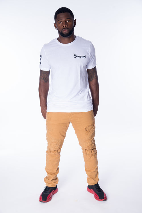 Coooyah Jamaica.  Mens graphic tee with Lion of Judah print on the back.  Jamaican streetwear clothing brand since 1987.   IRIE