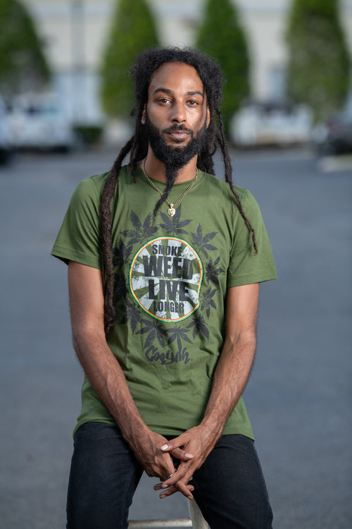 Cooyah Jamaica. Smoke Weed Live Longer Tee. Cannabis, Kush screen printed graphic tee in olive green. Men's short sleeve ringspun cotton t-shirt. Jamaican clothing brand.