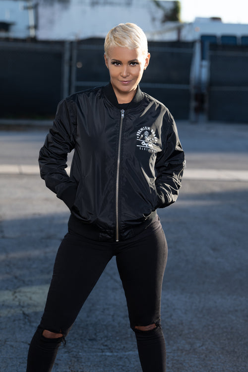 Cooyah Womens Premium Brand Lion Bomber Jacket in black.  As a Jamaican owned clothing brand since 1987, we take pride in bringing you this classic piece.