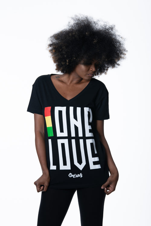 Cooyah Jamaica. One Love women's graphic tee in black. V-Neck, short sleeve, ringspun cotton screen printed in reggae colors. Jamaican clothing brand.