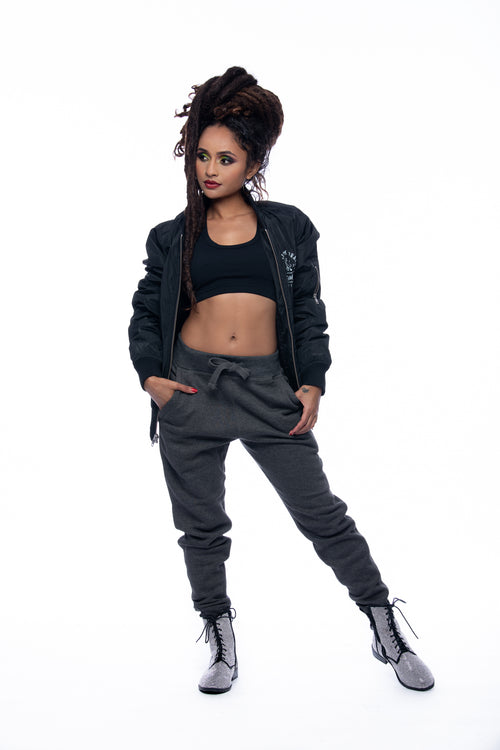 Cooyah Jamaica, Women's Premium Brand Lion Bomber Jacket in black.  As a Jamaican owned clothing brand since 1987, we take pride in bringing you this classic piece.