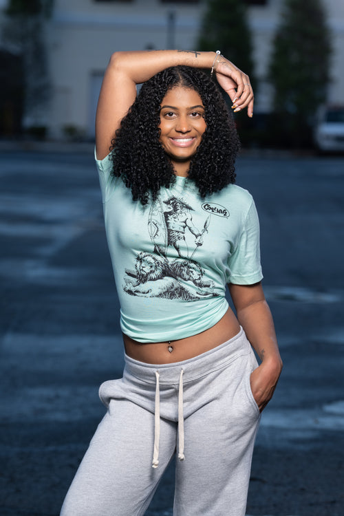 Cooyah Jamaica. Women's African Warrior graphic tee in blue. Short sleeve, soft, ringspun cotton.