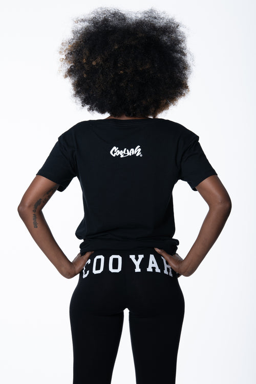 Cooyah Jamaica - Women's black One Love graphic tee and leggings. As a Jamaican owned clothing brand since 1987, we take pride in bringing you this classic shirt.