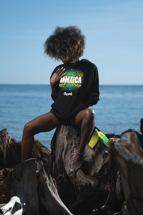 Cooyah Jamaica women's hoodie in black. Featuring a Jamaican Flag graphic.  Reggae Caribbean clothing brand.