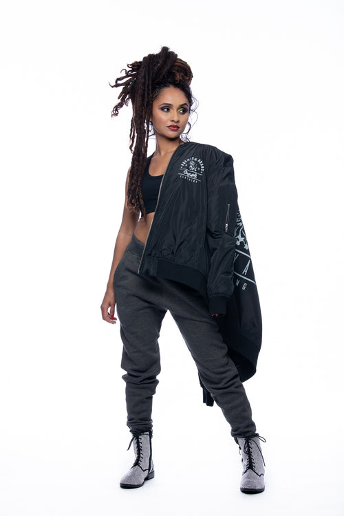 Cooyah Jamaica, Premium Brand Lion Bomber Jacket in black.  As a Jamaican owned clothing brand since 1987, we take pride in bringing you this classic piece.