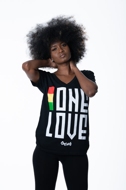 Cooyah Jamaica. One Love women's graphic tee in black. V-Neck, short sleeve, ringspun cotton screen printed in reggae colors. Jamaican clothing brand.