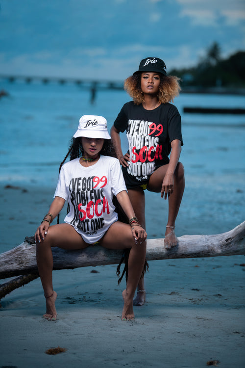 Cooyah Jamaica. I've Got 99 Problems and Soca is Not One. Women's Ringspun cotton, short sleeve graphic white and black tees. Jamaican clothing brand.