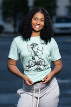 Cooyah Jamaica.  Women's African Warrior graphic tee in blue. Short sleeve, soft, ringspun cotton.