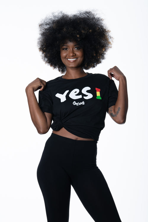 Cooyah Clothing women's short sleeve black crew neck tee. Yes i graphic screen printed in rasta colors. We are a Jamaican owned clothing company established in 1987. IRIE