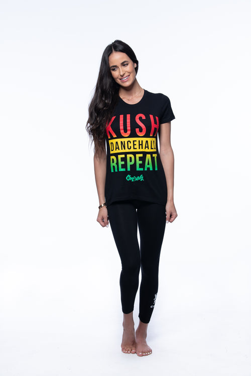Cooyah Jamaica. Women's Kush, Dancehall graphic tee in black. Screen printed with rasta colors design. Jamaican Clothing Brand. IRIE