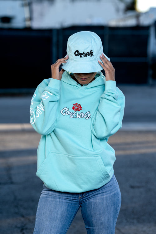 Mint Green cotton bucket hat by Cooyah Clothing with embroidery.  Jamaican streetwear, beachwear clothing.
